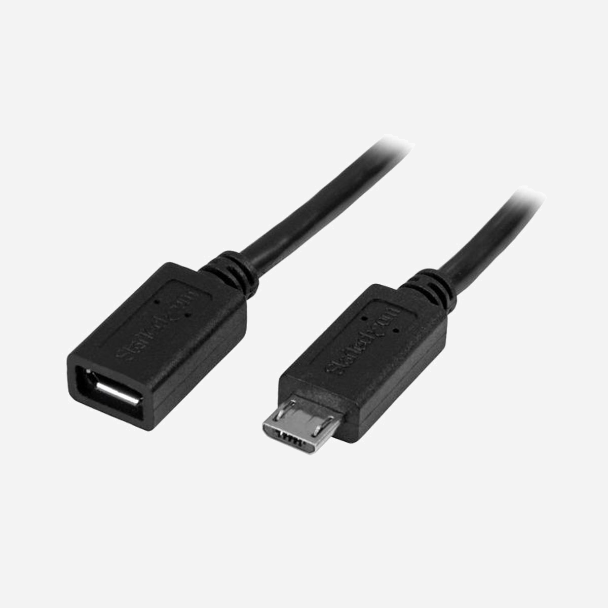 StarTech.com Câble Extension Micro USB 2.0 0.5m Noir - Mâle/Femelle, OTG, PVC, USB B, AWG 24/32, Blindage Aluminium Mylar, 480Mbit/s USBUBEXT50CM - Augmentez de 50 cm la portée de votre câble Micro-USB<br/><br/>Ce câble mâle/femelle étend la portée du port Micro-USB sur votre tablette ou téléphone de 50 cm et est compatible avec les adaptateurs OTG (USB On-The-Go).<br/><br/>Davantage, le câble vous offre un moyen facile de connecter votre tablette à une station d'accueil Android™, ce qui signifie que vous pouvez écouter de la musique et charger votre tablette à l'aide de la station d'accueil de votre téléphone.<br/><br/>Positionnez vos périphériques USB 2.0 à votre guise<br/><br/>La longueur supplémentaire vous permet de positionner vos périphériques USB 2.0 comme vous le souhaitez. Il vous suffit de brancher le câble d'extension à votre téléphone ou votre tablette et de brancher votre adaptateur OTG au câble.<br/><br/>Grâce aux 50 cm supplémentaires, vous disposez d'une longueur suffisante pour placer vos appareils compatibles USB OTG de la manière qui vous convient. Vous pouvez placer votre clé USB à l'écart ou positionner vos appareils tels que votre clavier ou votre souris de façon plus confortable.<br/><br/>Ce câble d'extension peut vous permettre d'obtenir la longueur supplémentaire nécessaire pour vous connecter à un câble micro USB de charge et de synchronisation hors de portée.<br/><br/>Connectez votre tablette à une station d’accueil Android<br/><br/>Ce câble d’extension de 50 cm vous permet également de connecter votre tablette Micro-USB à une station d’accueil Android. En branchant le connecteur femelle à la station d’accueil et le connecteur mâle à votre tablette, vous pouvez écouter de la musique et charger votre tablette au moyen d’une station d’accueil de téléphone à laquelle votre tablette ne pourrait normalement pas être connectée.<br/><br/>The StarTech.com Advantage<br/>