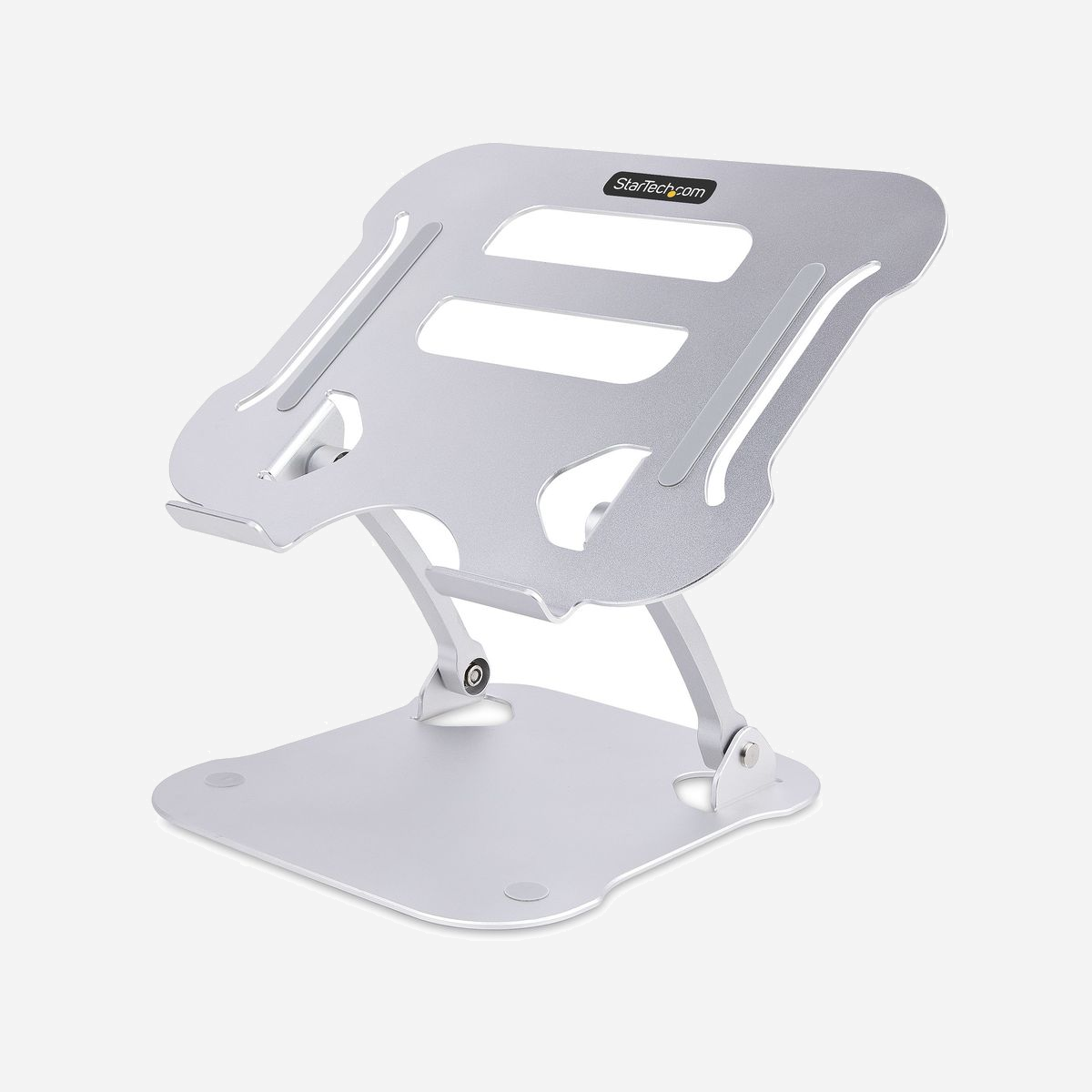 StarTech.com ADJ-LAPTOP-RISER : Support de Bureau Ergonomique Pliable Aluminium Argenté pour Ordinateur Portable jusqu'à 10kg, Hauteur Ajustable (jusqu'à 12cm), 226x269x50mm - Hauteur et inclinaison variables - Ventilé - Poids Léger (714g)<br/><br/>Réglez la hauteur et l'inclinaison d'un ordinateur portable à hauteur des yeux pour un confort ergonomique et une productivité accrue. Le support élévateur pour ordinateur portable supporte tout ordinateur portable avec une capacité de poids maximale de 10kg. La conception légère et pliable permet un transport rapide et un stockage pratique. Une fois replié, le support élévateur mesure 27x22,5x5cm.<br/><br/>Inclinaison pour une visualisation idéale<br/><br/>Ce support ergonomique pour ordinateur portable dispose de réglages d'inclinaison et de hauteur (jusqu'à 12cm) pour établir l'angle de vision le plus confortable. Réglez la tension des bras de support, à l'aide de l'outil inclus, pour divers réglages de poids, d'inclinaison et de hauteur. Les rebords surélevés (18mm), situés à l'avant de la plate-forme pour ordinateur portable, permettent à ce dernier de rester en place lorsque la plate-forme est inclinée. Les coussinets en caoutchouc autour de la surface aident à protéger l'ordinateur portable contre les dommages esthétiques.<br/><br/>Un support stable pour ordinateur portable<br/><br/>Le support pour ordinateur portable présente une finition anodisée argentée avec une FABRICATION en aluminium pour assurer la durabilité et la robustesse. La zone de surface ventilée est surélevée pour favoriser le refroidissement passif et le flux d'air. L'espace situé sous la plateforme pour ordinateur portable peut être utilisé pour ranger un clavier, une souris et/ou d'autres accessoires et périphériques lorsqu'ils ne sont pas utilisés.<br/><br/>Les pieds en caoutchouc antidérapants aident à protéger la surface du bureau des rayures et des éraflures, y compris les bureaux à plateau en verre. Le rehausseur d'ordinateur portable pour bureau est expédié entièrement assemblé pour une utilisation immédiate.<br/><br/>The StarTech.com Advantage<br/>