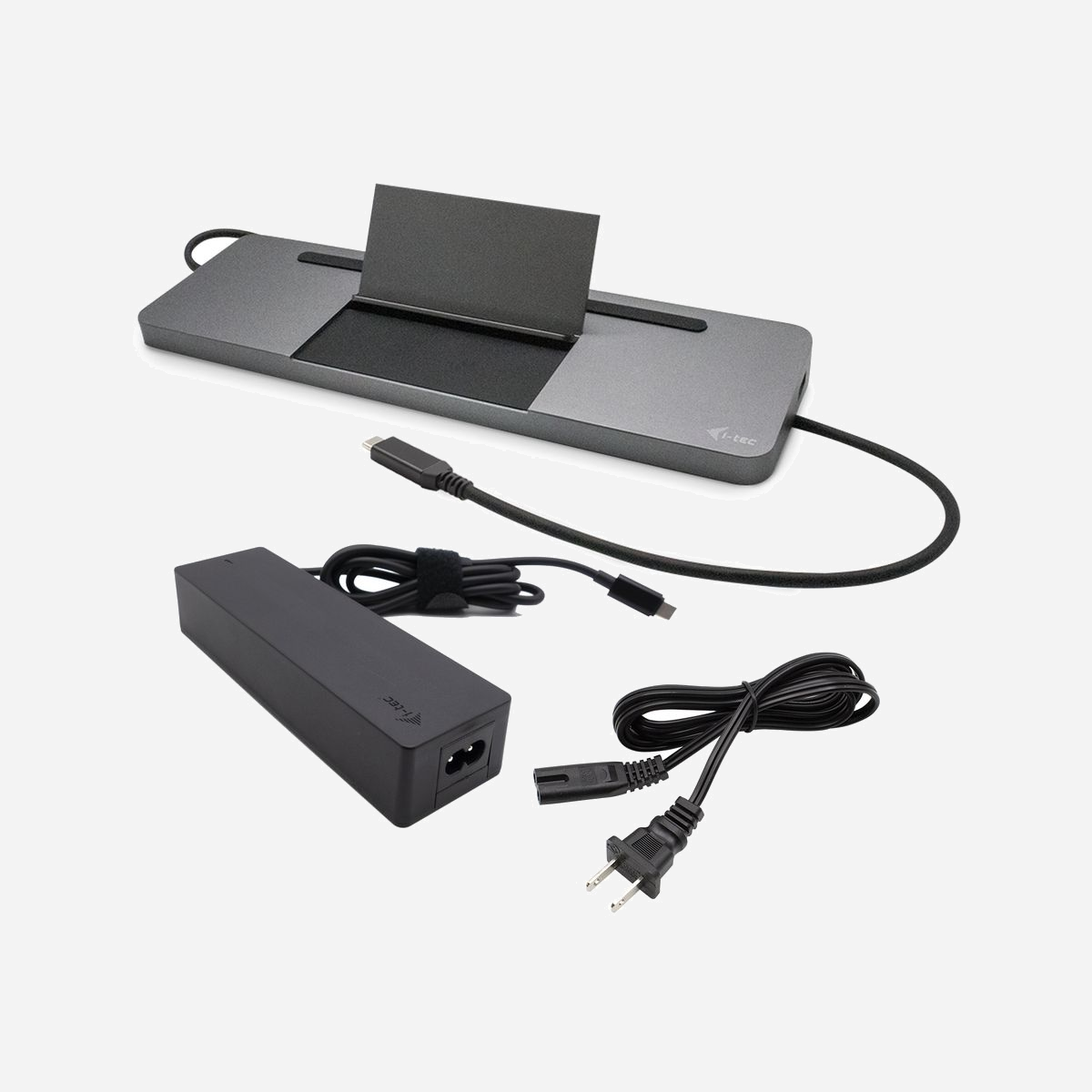 i-tec C31FLATPRO100 : Station d'accueil USB-C 3.2 Gen 1 4K Triple Display (HDMI, DP, VGA), Power Delivery 85W, USB-A/C, Ethernet, Lecteur SD/MicroSD, Gris, Compatible Windows/macOS/Linux/Android/ChromeOS + Chargeur Universel 100W - Ce produit est un kit comprenant une station d’accueil et un adaptateur de charge universel. En achetant ce kit, vous obtenez une solution complète qui vous permet de connecter facilement vos accessoires préférés, y compris au réseau local et aux moniteurs externes, et de charger votre appareil facilement et commodément (y compris votre ordinateur portable ou tablette).<br><br>STATION D’ACCUEIL<br><br>Connectez vos périphériques favoris à votre ordinateur portable, tablette tactile, ordinateur de bureau (PC) ou téléphone intelligent qui disposent de la nouvelle interface USB-C ou Thunderbolt 3. L’utilisation de cette station d’accueil vous rendra possible de profiter de l’alimentation, ainsi que de la sortie pour jusqu’à trois écrans d’affichage externes (ça comprend des systèmes avec Windows).<br><br>Connectez la station d’accueil par un seul câble (de 60 cm) à l’USB-C ou au port l’ordinateur adapté à l’interface Thunderbolt 3 de et vous pouvez immédiatement commencer à l’utiliser. L’installation des pilotes se fait automatiquement depuis le système. Nous avons conçu les stations d’accueil pour qu’elle puisse être utilisée également comme support ergonomique pour votre notebook ou tablette.<br><br>Remarque : En ce qui concerne le système d’exploitation macOS, il ne supporte pas la technologie Multi Stream Transport (c’est-à-dire 2 écrans d’affichage dans le régime d’étendre). C’est qu’aucune station d’accueil, utilisant l’USB-C DisplayPort Alt Mode, ne supporte le branchement de deux écrans d’affichage sous macOS.<br><br>ADAPTATEUR DE CHARGE<br><br>Cet adaptateur d’alimentation universel USB-C, dont rendement est 112 W, est un bon choix pour l’alimentation de toute la sorte des ordinateurs portables ou d’autres périphériques qui disposent du connecteur USB-C et supportent l‘USB-C Power Delivery avec l’exigence de la puissance absorbée maximale 100 W.<br><br>La tension sera ajustée automatiquement, conformément à l‘USB Power Delivery spécification 2.0 v1.2 dans les différents profils et dans les pas : 5V / 9V / 12V / 15V / 19V / 20V, avec la prise maximale 5 A. Cet adaptateur d’alimentation dispose d’un poids réduit, alors il est très facile de le déplacer. L’adaptateur dispose de la protection intelligente contre surintensités de courant, contre surtensions, ainsi que contre court-circuit et surchauffe.