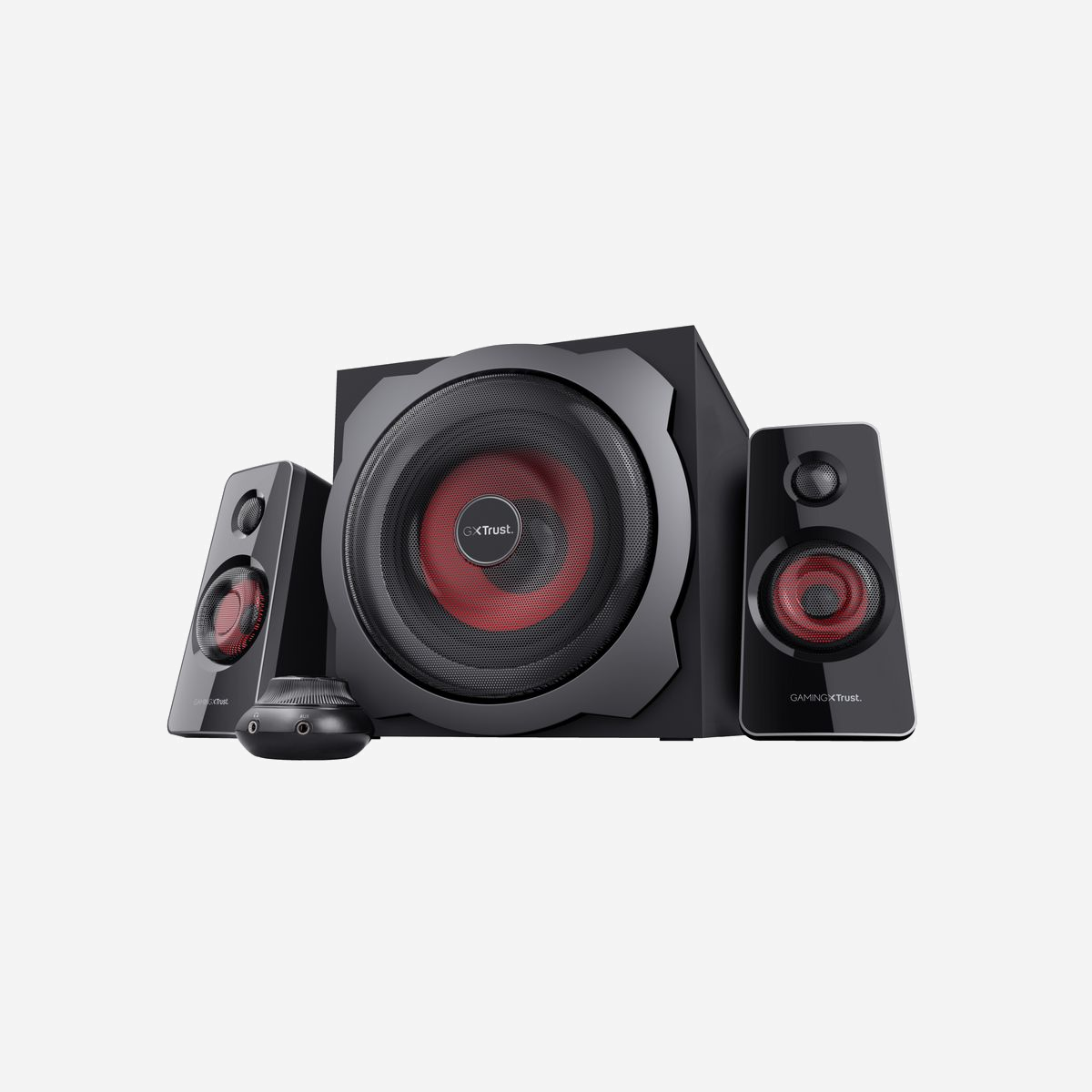 Trust GXT 38 2.1 Noir, Système Audio 60W RMS, Caisson de Basses XL, Connectivité Filaire 3.5mm, pour PC/Console, 4.1kg - Un son et des basses inégalés<br>Grâce à sa puissance de crête de 120 W, le GXT 38 permet de développer un mur de son. Ce jeu d'enceinte est composé d'un caisson de basse en bois XL et d'une enceinte de 7 pouces produisant un son de basse dont vous ressentirez la puissance. Les enceintes satellites offrent une qualité audio optimale dans les médiums et les aigus. Les commandes latérales du caisson de basse vous permettent de contrôler séparément le niveau de basse et de régler ainsi le son en fonction de vos souhaits.<br><br> <br><br>Le son de qualité supérieure produit par ce jeu d'enceinte le destine à l'écoute de la musique, le visionnage de films ou les jeux.<br>Conception orientée jeu<br>Cette enceinte possède a fait l'objet d'une conception robuste avec des accents rouges prédominants : elle offre non seulement une reproduction audio inégalée, mais possède également une conception clairement orientée jeu. La grille du caisson de basse possède un aspect saisissant qui, associé au noir brillant des enceintes satellites, en fera le complément idéal de toutes les configurations de jeu !<br>Simplicité d'utilisation<br>Ce jeu d'enceintes se raccorde facilement à votre PC via la connexion 3,5 mm. Grâce au câble inclus, vous pouvez utiliser ce jeu d'enceintes avec votre console de jeu, qu'il s'agisse d'une Playstation 3, d'une Wii or d'une Xbox 360.<br><br> <br><br>La télécommande filaire incluse vous permet de contrôler facilement le volume. En prime, cette dernière offre des connexions supplémentaires pour raccorder votre casque et la brancher à n'importe quel périphérique audio, tel qu'un lecteur MP3, un smartphone ou une tablette. Le niveau de basse est réglable facilement en fonction de vos exigences, via les commandes latérales du caisson de basse.