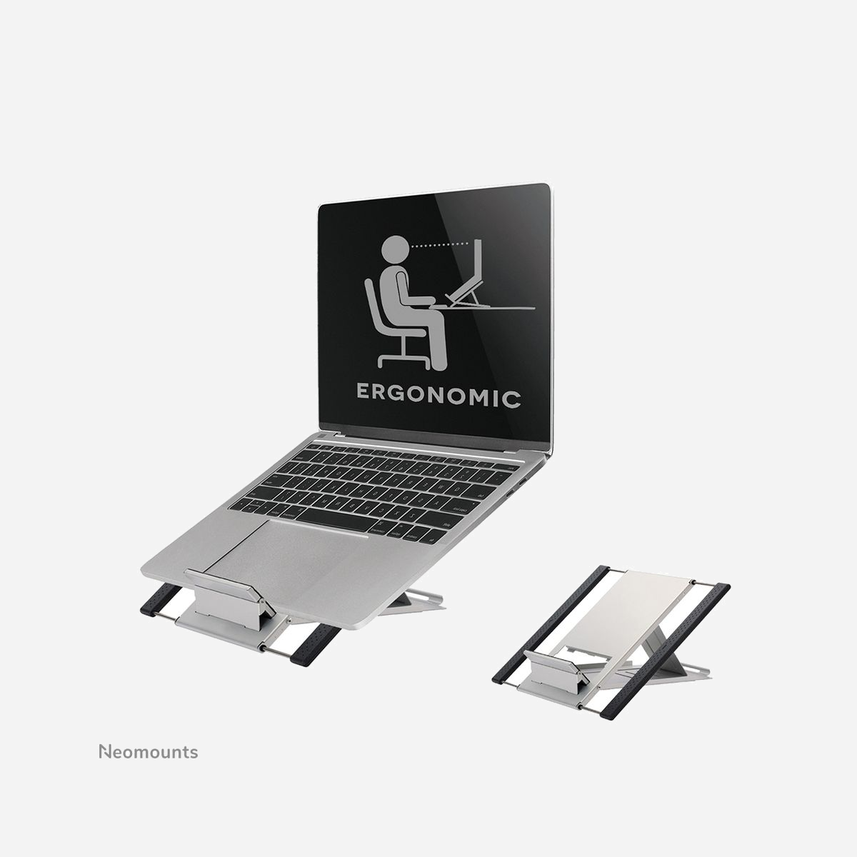 Neomounts NSLS100 Support Aluminium pour Notebook 10-22" (25.4-55.9cm), Inclinaison 0-52°, Charge 5kg, Ajustable 180-270mm, Compact & Pliable - Le support Neomounts universel pour iPad, tablette et ordinateur portable, modèle NSLS100 est un support universel pour tablettes et ordinateurs portables jusqu'à 22" (55 cm).<br><br>Il offre six positions d'inclinaisons différentes pour un maximum de confort. Largeur réglable pour s'adapter à la plupart des ordinateurs portables et des tablettes. La conception évidée unique évite les problèmes de surchauffe pour tablette et ordinateur portable à vitesse maximale. Le support NS-LS100 est l'outil idéal pour les voyages. Compact, léger et facile à transporter. <br><br>Ce modèle supporte 5 kilos, permet une inclinaison jusqu'à un angle de 52° et propose des mesures de profondeur uniques de 25cm et de largeur extensible de 18 à 27 cm.<br><br>Des maux de cou et de dos peuvent être évités en utilisant un support ergonomique. Idéal pour une utilisation dans les bureaux et sur les comptoirs ou dans une zone de réception.<br><br>Tout le matériel d'installation est fourni avec le produit.