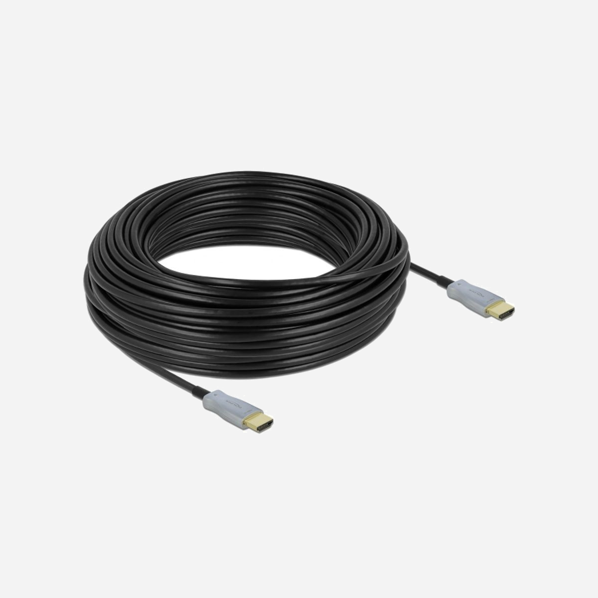 DeLOCK Câble Optique Actif HDMI 30m 4K 60Hz, Connecteurs Type A Mâle, HDCP 1.4/2.2, 18 Gbit/s, HDR, Fibre Optique, Diamètre 5.4mm - Ce câble de Delock peut être utilisé pour connecter une interface HDMI, ex. écrans ou télés, à un PC ou un laptop. Ce câble optique actif est particulièrement fin et peut transmettre des signaux sans perte sur les longues distances.