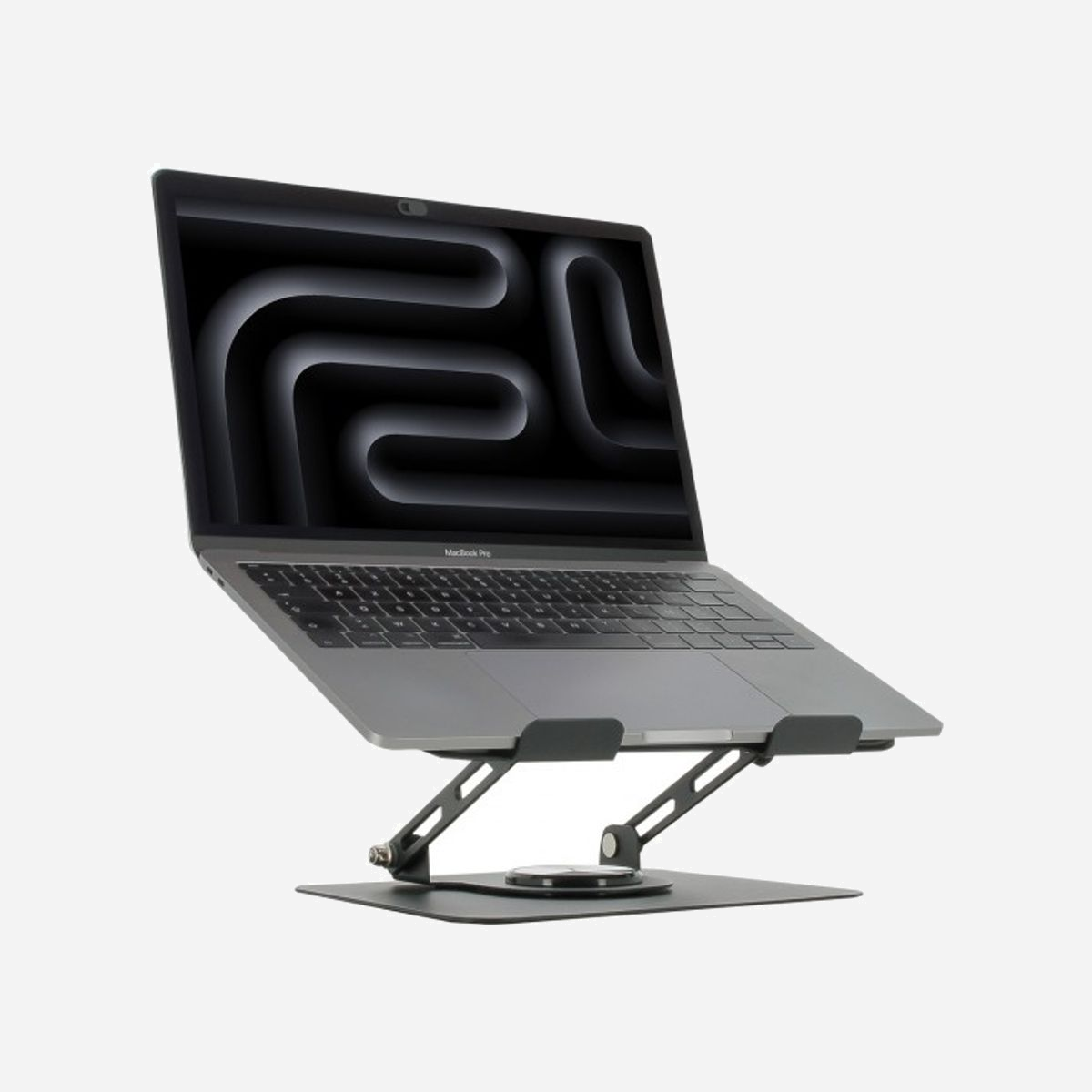 Mobilis Support PC/Tablette 17" Métal Noir 001390 : Rotatif 360°, Réglable en Hauteur/Angle, Pliable, Base Antidérapante, Ventilation Active, 1.36kg - Le support PC ergonomique est un accessoire polyvalent conçu pour offrir un confort optimal et une meilleure posture de travail. Grâce à sa compatibilité universelle, il peut accueillir la majorité des ordinateurs portables, jusqu’à 17''.<br><br>Sa structure en métal, à la fois robuste et élégante, assure une excellente stabilité, tandis que sa base équipée de patins antidérapants protège efficacement votre surface de travail contre les glissements et les rayures. Le support dispose d’un pied rotatif à 360°, idéal pour partager son écran sans effort ou ajuster rapidement l’orientation de l’appareil. Il est doté d'une zone d'aération qui favorise la circulation de l'air, limitant ainsi les risques de surchauffe, même lors d’une utilisation prolongée.<br><br>Pour garantir un maintien sûr, il est doté de crochets de sécurité et de zones antidérapantes situées aux quatre coins du plateau, assurant une parfaite adhérence de l’ordinateur quelle que soit son inclinaison. Entièrement réglable en hauteur et en angle, ce support s’adapte facilement à votre position et contribue à soulager les tensions cervicales et dorsales. Il est également pliable, ce qui permet de le ranger ou de le transporter très facilement.