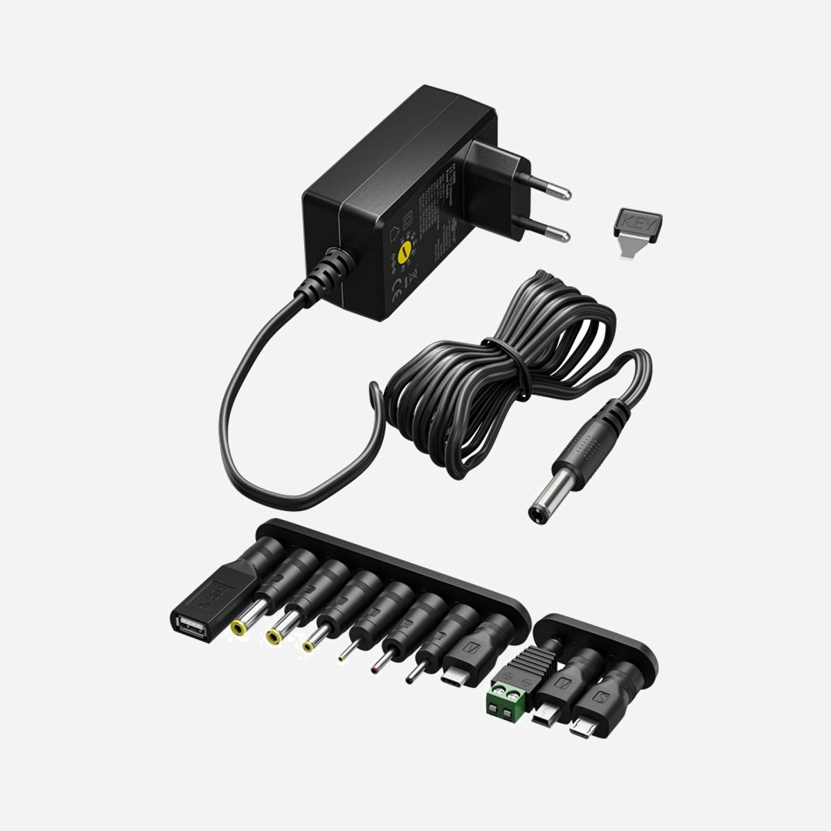 Chargeur universel Goobay 64569 secteur 11 adaptateurs DC USB-C USB-A Mini-B Micro-USB noir intérieur - Le chargeur universel Goobay 64569 s'impose comme la solution d'alimentation polyvalente pour les environnements professionnels équipés d'appareils électroniques variés. Avec ses 11 adaptateurs inclus, ce chargeur élimine le besoin de multiplier les blocs d'alimentation sur votre bureau ou dans vos espaces de travail. Cette alimentation secteur de 18 W intègre 7 adaptateurs DC interchangeables ainsi que des connecteurs USB-C, USB-A, USB Mini-B et Micro-USB, couvrant ainsi la quasi-totalité des petits équipements électroniques professionnels : routeurs réseau, modems, équipements audio, périphériques informatiques, dispositifs de communication et bien d'autres appareils courants en entreprise. La tension de sortie ajustable de 3 V à 12 V avec six niveaux de puissance (de 4,5 W à 13,5 W) garantit une compatibilité optimale avec vos différents équipements. Le courant de sortie stable de 1,5 A sur chaque port assure une alimentation fiable et sécurisée. Son format compact (76,5 x 69,2 x 44 mm) et son poids plume de 105 g facilitent le transport et l'intégration dans tout environnement de travail. Le câble de 1,8 m offre une flexibilité d'installation appréciable, tandis que la compatibilité Plug and Play permet une mise en service immédiate sans configuration. Certifié CE et conforme aux normes européennes, ce chargeur universel représente un investissement rationnel pour rationaliser la gestion des alimentations électriques et réduire l'encombrement des prises multiples dans vos locaux professionnels.