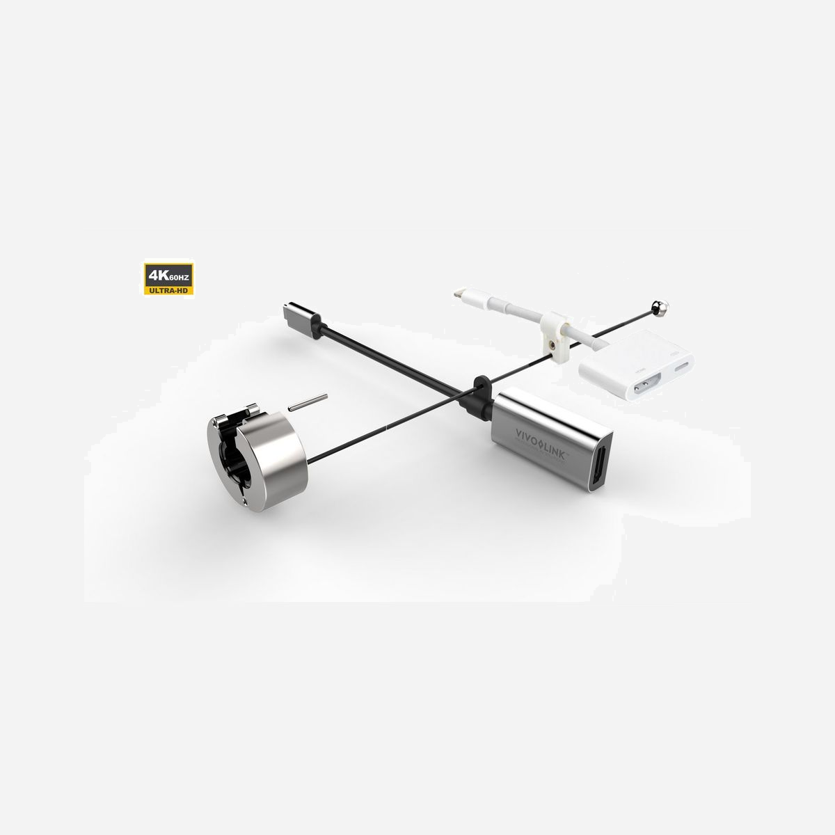 Adaptateur Vivolink PROADRING10S USB-C vers HDMI 4K@60Hz aluminium argent avec anneau multi-adaptateurs pour salle de réunion - L'adaptateur Vivolink PROADRING10S transforme vos salles de réunion en espaces de collaboration universels. Conçu pour éliminer les problèmes de compatibilité récurrents lors des présentations, cet adaptateur USB-C vers HDMI garantit que chaque participant peut connecter son équipement sans difficulté. Sa conception en aluminium haut de gamme avec gravure laser allie robustesse et esthétique professionnelle. Le format compact s'adapte parfaitement aux ultraportables modernes tout en offrant des performances techniques de premier plan : résolution 4K à 60Hz, compatibilité HDMI 2.0b, prise en charge HDR et audio multicanal 7.1. Le système d'anneau multi-adaptateurs se fixe directement au câble HDMI de votre salle grâce à une serrure unbraco sécurisée, empêchant les pertes et garantissant la disponibilité permanente de l'équipement. Le connecteur USB-C évolutif assure une compatibilité durable avec les générations actuelles et futures d'ordinateurs portables, qu'ils fonctionnent sous Windows ou macOS. La certification HDCP 2.2 permet la diffusion de contenus protégés sans restriction, tandis que la fonction Plug and Play élimine tout besoin d'installation de pilotes. Avec son câble de 4 mm de diamètre et ses 66 grammes seulement, l'adaptateur reste discret et facile à manipuler. Investir dans le PROADRING10S, c'est réduire les temps morts en réunion, améliorer l'expérience utilisateur de vos visiteurs et projeter une image de professionnalisme. Une solution technique éprouvée pour des présentations fluides au quotidien.