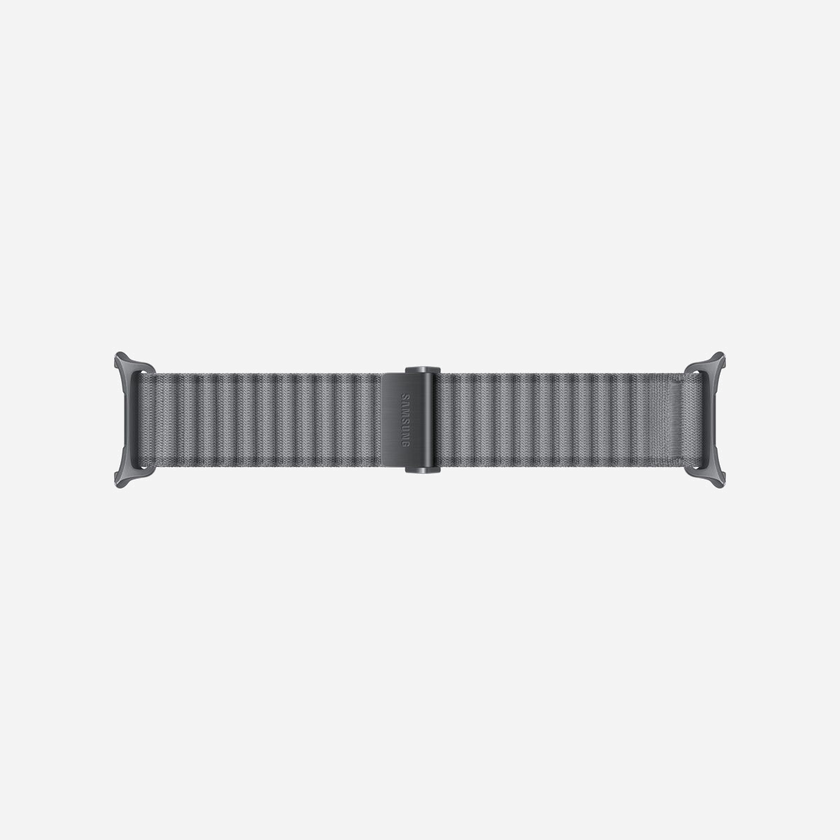 Bracelet Samsung Trail Band tissu gris tailles S/M/L pour Galaxy Watch Ultra2 largeur 52mm référence ET-SVL70MJEGEU - Le bracelet Samsung Trail Band ET-SVL70MJEGEU représente la solution idéale pour les utilisateurs de Galaxy Watch Ultra2 recherchant confort et robustesse au quotidien. Conçu en tissu de qualité, ce bracelet gris offre une alternative élégante et respirante aux bracelets traditionnels, particulièrement appréciée lors d'activités sportives ou d'un usage prolongé. Sa conception ajustable en trois tailles S/M/L garantit un ajustement optimal à tous les poignets, avec un système de fixation simple et sécurisé. Le format unisexe et la couleur gris neutre s'adaptent à tous les styles, du cadre professionnel aux loisirs actifs. Avec seulement 20 grammes, ce bracelet préserve le confort de port caractéristique de votre montre connectée. La largeur de 52 mm assure une compatibilité parfaite avec la Galaxy Watch Ultra2, tandis que le matériau textile offre une résistance accrue aux contraintes quotidiennes. Idéal pour les sportifs, les professionnels actifs ou simplement pour varier les styles selon vos activités, ce bracelet se monte et se démonte facilement, permettant de personnaliser votre montre en quelques secondes. Samsung garantit ce produit pendant 2 ans, témoignant de la qualité de fabrication. Que vous pratiquiez la randonnée, le fitness ou recherchiez simplement un bracelet confortable pour un usage quotidien, le Trail Band constitue un accessoire pratique et durable pour votre Galaxy Watch Ultra2.