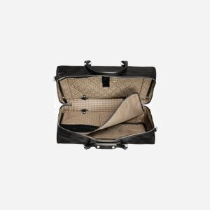 Sac de voyage dbramante1928 WKAAGTBL1021 en cuir noir, 520x280x290mm, un compartiment, port main & bandoulière amovible, fermeture à glissière, poids 1.75kg - Miniature 2